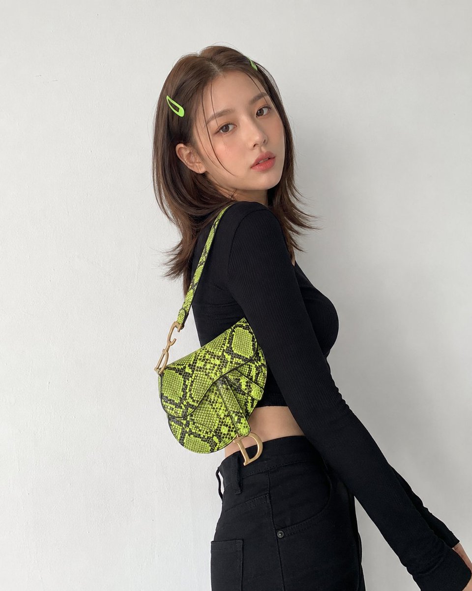 Image Featuring a Young Korean Woman with Mid-length Brown Hair Styled with Lime Green Hair