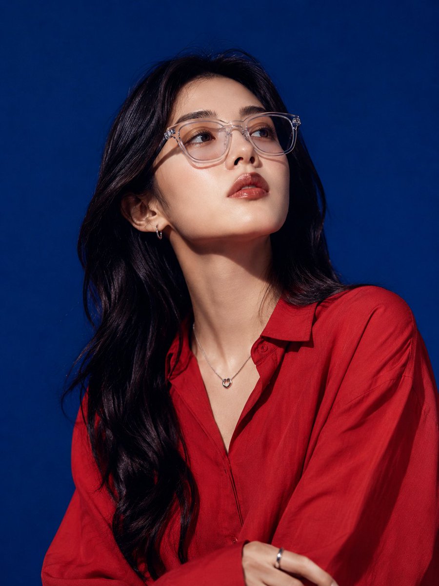High-fashion Studio Portrait of a Beautiful Young East Asian Woman with Long Wavy Black Hair
